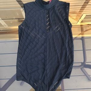 Black one piece. Never worn.